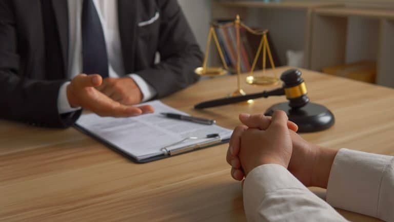 lawyer and client at desk